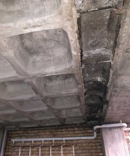 کاشت میلگرد به جهت برطرف نمودن ضعف اجرایی و عدم اتصال صحیح دال به تیرهای اصلی سازه ، تقویت دال بتنی و تیر به جهت انتقال صحیح نیروهای دال به تیر بتنی